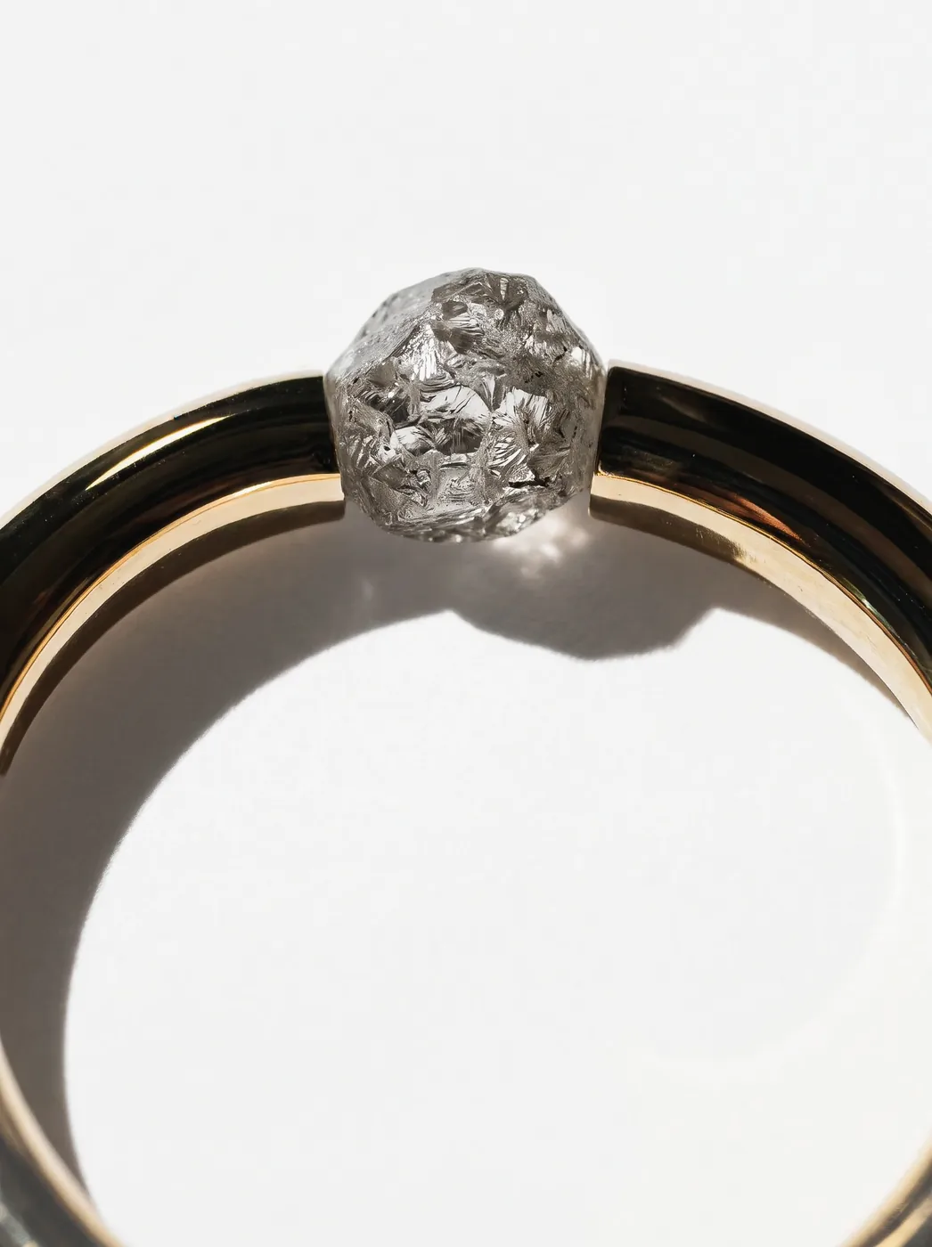 Rough Ring I, No. 009, a close view of the rough diamond held between the two ends of the polished band